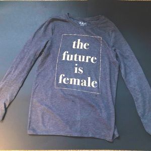 A Child’s 14p, long sleeve grey tee.